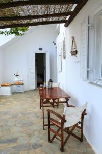 A patio or other outdoor area at Paros Rita Studios Még 22 kép