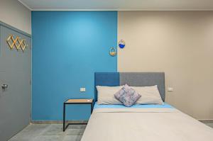 A bed or beds in a room at Bedcoin Hostel