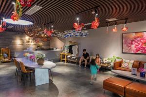 A seating area at The Glomad Boutique Danang