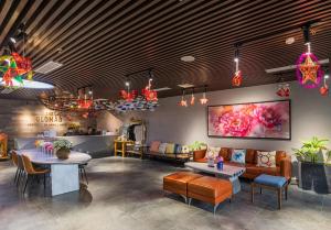 A television and/or entertainment centre at The Glomad Boutique Danang