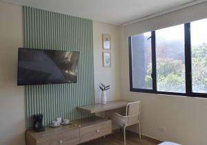 تلفاز و/أو أجهزة ترفيهية في Mythical Hotel Boutique