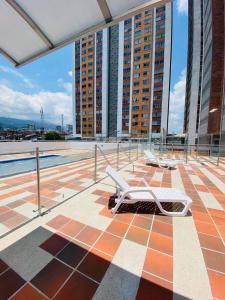 two beds on the roof of a building at Apartamento en Bucaramanga in Bucaramanga
