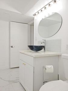 a bathroom with a black sink and a mirror at New on Bsu Campus 3 beds Fully Remodeled in Boise