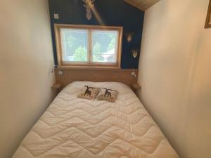 Postel nebo postele na pokoji v ubytování Appartement avec balcon et parking, vue sur montagnes - FR-1-692-88