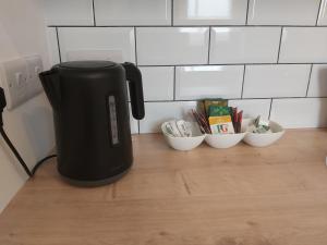 a coffee maker sitting on a counter in a kitchen at Flat 7 - Newly Renovated in Portsmouth