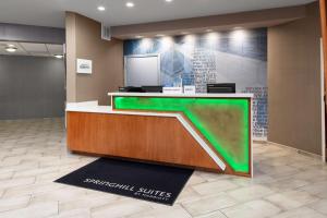 a lobby with a reception desk with at SpringHill Suites by Marriott Baton Rouge South in Baton Rouge