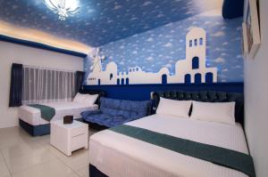 Postel nebo postele na pokoji v ubytování Easy Home Stay