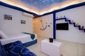 TV a/nebo společenská místnost v ubytování Easy Home Stay