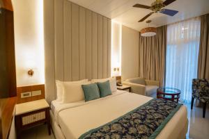 Voodi või voodid majutusasutuse Evershine Resort & Spa toas