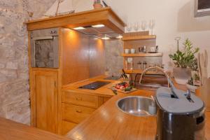 Kuchyň nebo kuchyňský kout v ubytování Holiday Home Rudina