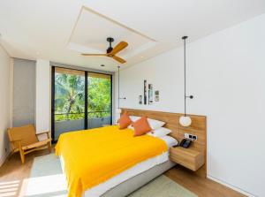 Postel nebo postele na pokoji v ubytování Sailing Luxury Phu Quoc Villas + 24 fotografií