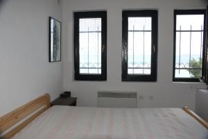 Säng eller sängar i ett rum på Villa Panorama Struga, Elen Kamen