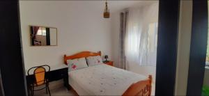 Postel nebo postele na pokoji v ubytování RESIDENCE AL Hoceima 2 Minutes de prés de PLAGE CALABONITA