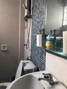 Ένα μπάνιο στο Homestay Ruma Melaka +11 φωτογραφίες