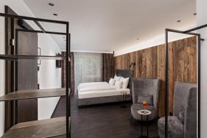 מיטה או מיטות בחדר ב-Hotel Gappmaier