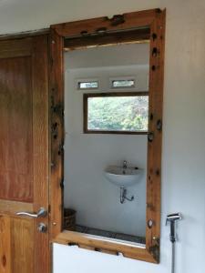 Ένα μπάνιο στο Rambai Tree Jungle Lodges