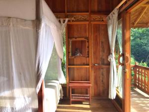 Μπαλκόνι ή βεράντα στο Rambai Tree Jungle Lodges