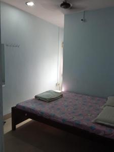 Postel nebo postele na pokoji v ubytování Centerpoint Guest House