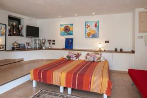 a bedroom with a bed in a room at CasaLeo HARRY - Roses / Costa Brava in Roses