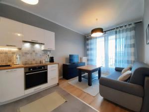 Kuchyň nebo kuchyňský kout v ubytování Premium Apartment - Witolda SKY 16th floor - SELF CHECK-IN - Parking