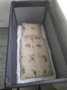 a suitcase with two pillows in it at Snoghoj,self check in,read listing in Fredericia