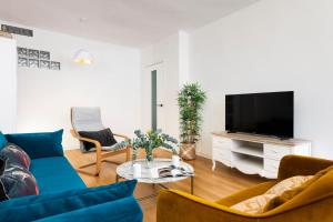 TV a/nebo společenská místnost v ubytování Misterhost Deluxe Santa Cruz I - cozy central and quiet