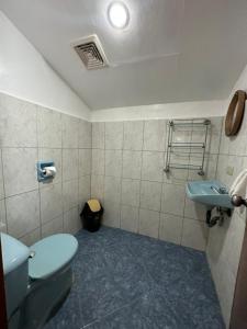 Koupelna v ubytování Garden of Eden Dive Resort