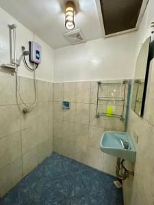 Koupelna v ubytování Garden of Eden Dive Resort