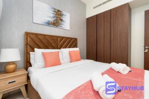 Postel nebo postele na pokoji v ubytování Lavish 1BR Apt near Dubai Mall