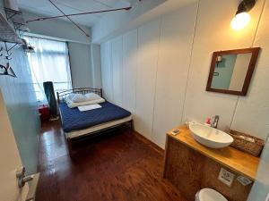 Postel nebo postele na pokoji v ubytování Hostel Bedgasm
