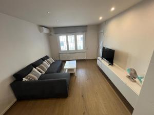Televízia a/alebo spoločenská miestnosť v ubytovaní Apartamento en la playa. Free Parking. Free WiFi + 10 fotografií