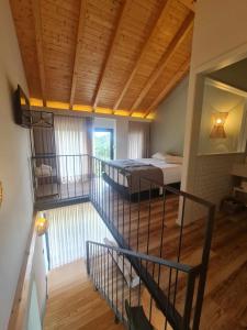 Postel nebo postele na pokoji v ubytování Ermo Loft - Casas do Ermo