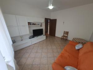 Et tv og/eller underholdning på Appartamento in centro a 30m dal mare