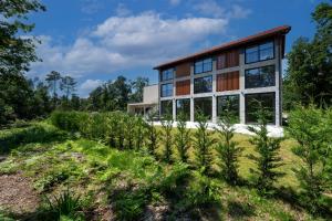 Um jardim em Ermo Loft - Casas do Ermo