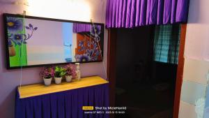 TV a/nebo společenská místnost v ubytování Kuala Rompin Town Homestay + 9 fotografií