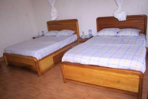 Кровать или кровати в номере Centre d'Accueil Casa dell'Annunciazione Rusizi- Kamembe- Cyangugu -Rwanda +11 фотографий