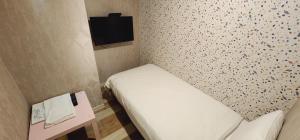 Televiisor ja/või meelelahutuskeskus majutusasutuses 慶爾喜旅館長沙館Cheers Loft Self Check-in Hotel