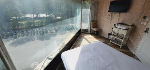 Voodi või voodid majutusasutuse 慶爾喜旅館長沙館Cheers Loft Self Check-in Hotel toas