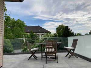 Balkón nebo terasa v ubytování Modernes Penthouse-Loft mit KONUSKarte für kostenfreien ÖPNV