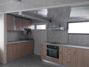 Dapur atau dapur kecil di Къща за гости Релиса