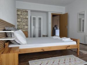 Un pat sau paturi într-o cameră la Vila Nova