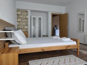 A bed or beds in a room at Vila Nova