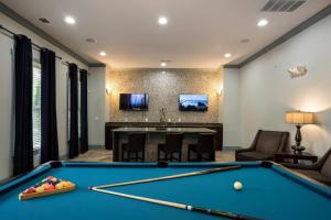 a billiard room with a pool table at Lovely 1-bedroom apartment w/ Pool + Wi-Fi in Charlotte