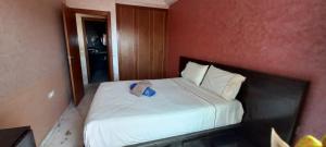 Postel nebo postele na pokoji v ubytování Appartement Tanger Boulevard Centre Ville + 13 fotografií