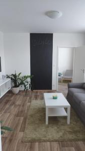 TV a/nebo společenská místnost v ubytování Byteček na Polní