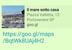 ein Screenshot einer SMS mit einem Foto eines Hafens in der Unterkunft IL MARE SOTTO CASA - Free parking in Fezzano