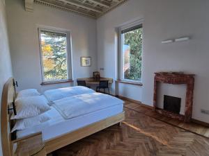 Postel nebo postele na pokoji v ubytování Villa Hermann + 34 fotografií