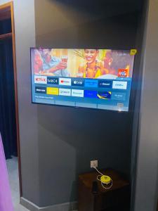 TV a/nebo společenská místnost v ubytování Dyvan Lounge & Cottages