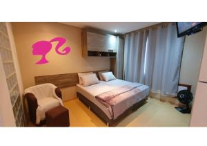 Ένα ή περισσότερα κρεβάτια σε δωμάτιο στο Apartamento Cozy Estúdio 306 na ZN