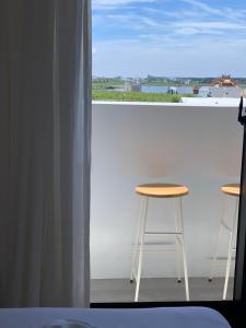 Balkón nebo terasa v ubytování SUNME Inn
